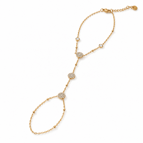 Amora gold-tone heart hand chain featuring pavé crystal heart motifs, polished gold heart charms, a delicate linked chain, and a sparkling finger-loop accent by INDAAH.