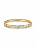 Anti-tarnish 18K gold-plated emerald-cut bezel bangle.