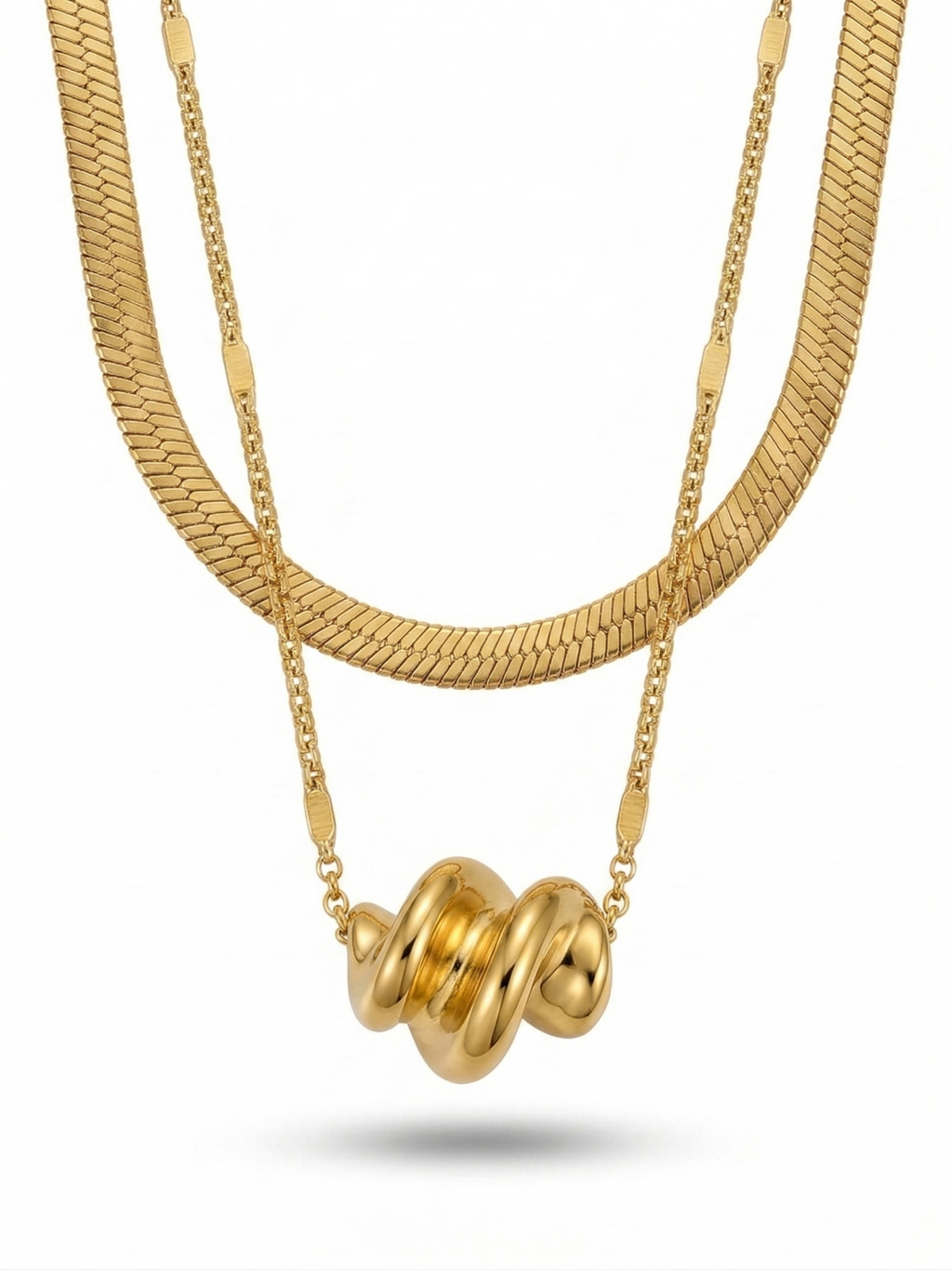 Anti-tarnish 18K gold-plated layered herringbone and twisted knot pendant necklace.
