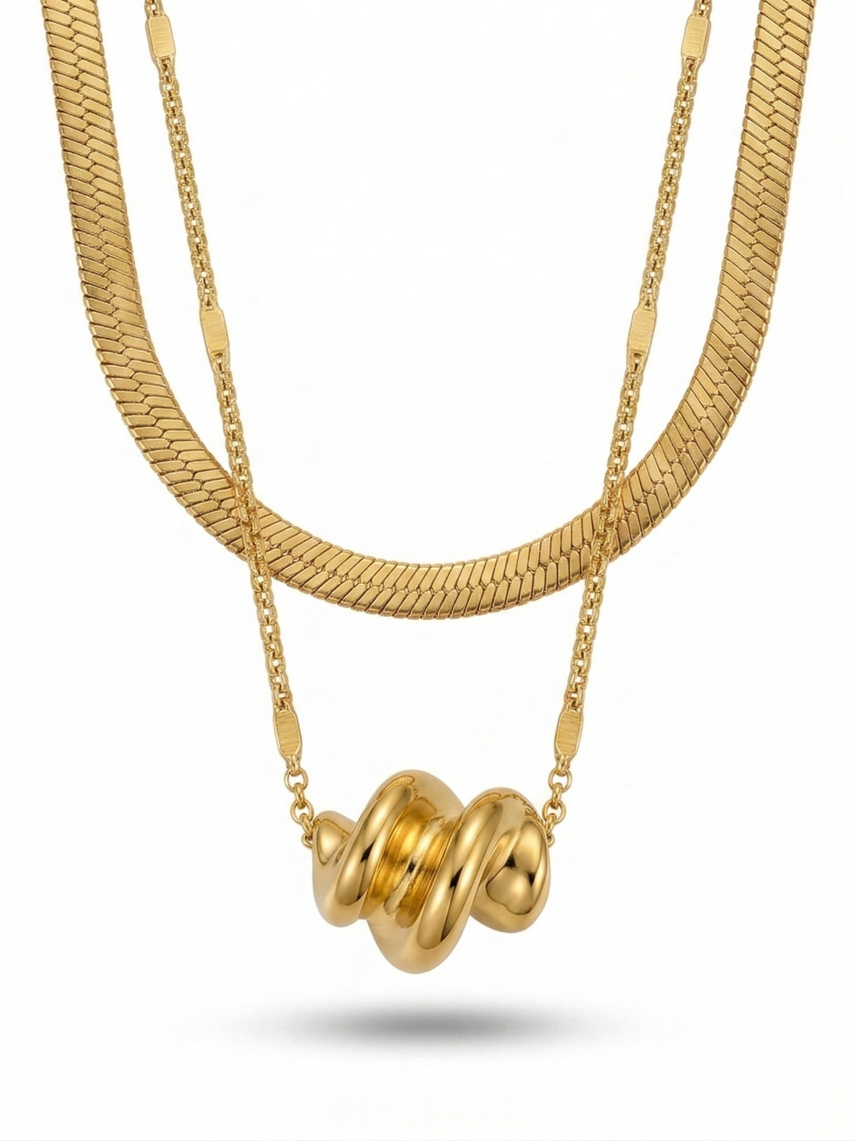 Anti-tarnish 18K gold-plated layered herringbone and twisted knot pendant necklace.