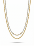 Anti-tarnish 18K gold-plated layered tennis and curb chain necklace.