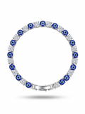 Anti-tarnish silver tennis bracelet with deep blue stones.