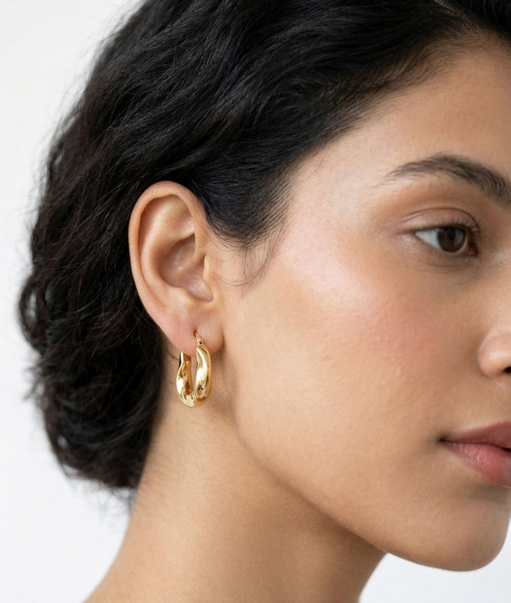 The Solstice Twist Hoops - 18K Gold Plated