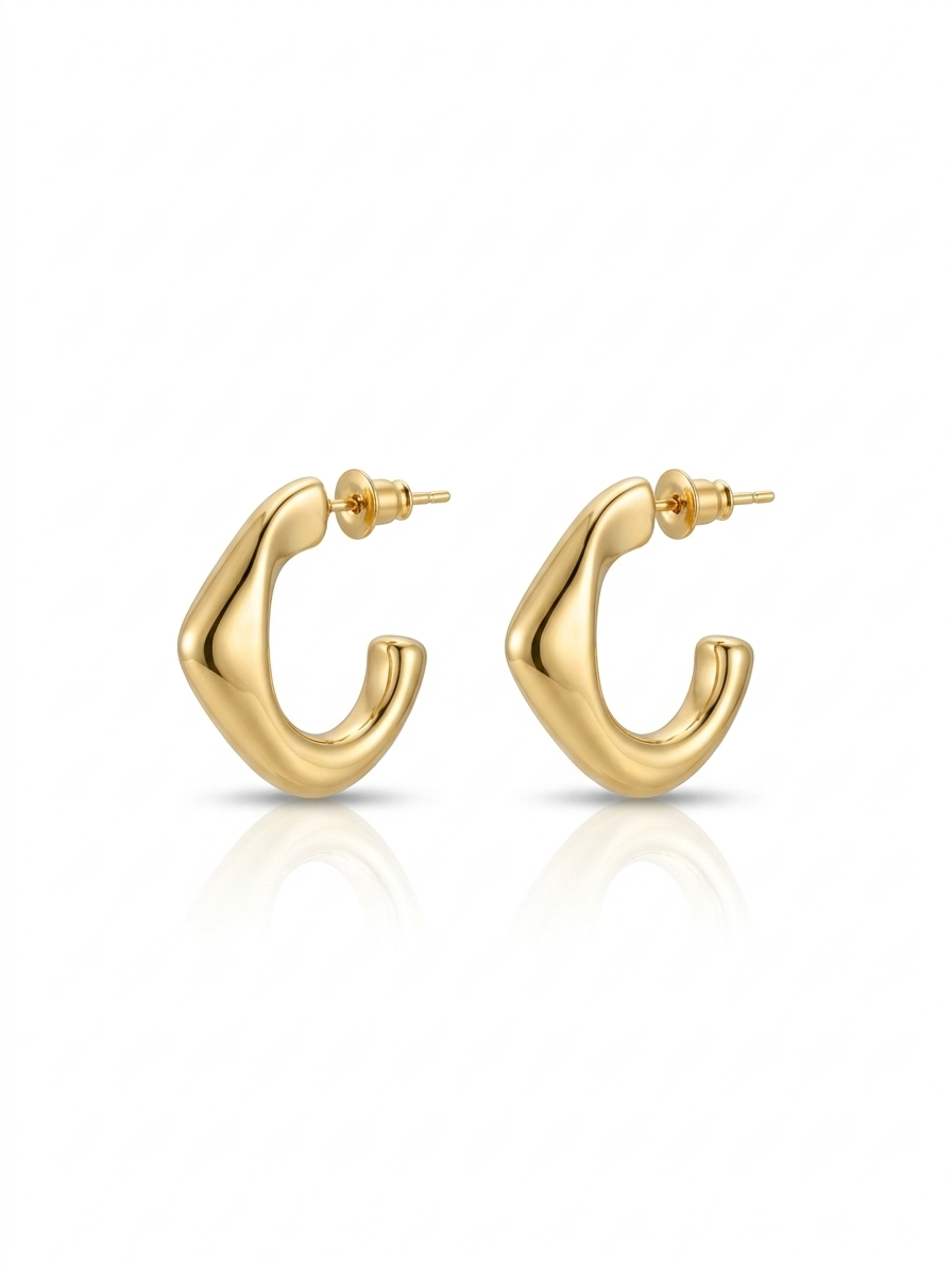 Pair of polished gold open hoop earrings with fluid sculptural curves shown on a pure white studio background.