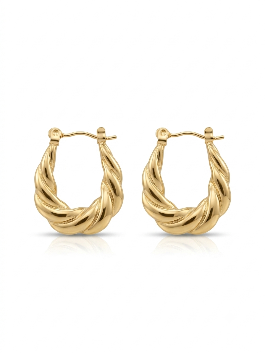 Pair of polished gold twisted croissant oval hoop earrings displayed against a plain white studio background.