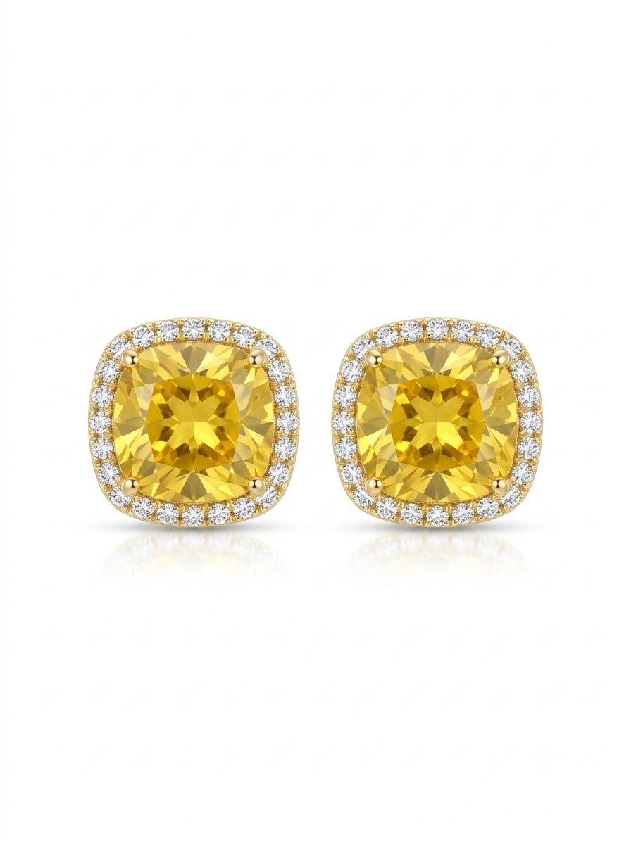 Pair of gold stud earrings featuring yellow cushion-cut center stones surrounded by clear pavé halo borders on a white studio background.