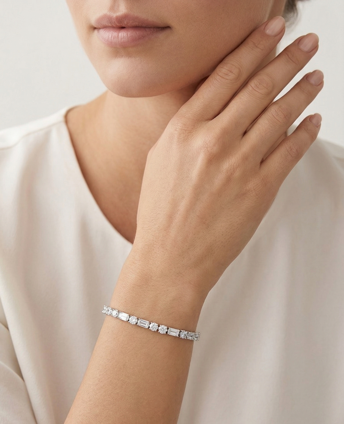 Women wearing Mixed-cut crystal tennis bracelet.