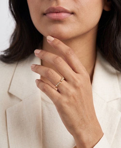 Model wearing Anti-tarnish 18K gold-plated crystal cluster open band ring for women.