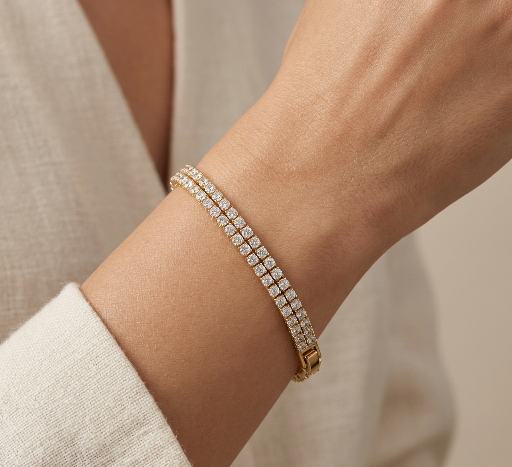 Model wearing Anti-tarnish 18K gold-plated double row eternity tennis bracelet.