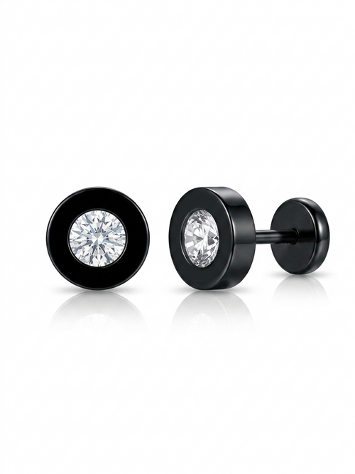 Pair of black stud earrings for men on display