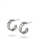 Pear-shaped drop earrings with a bezel setting.
