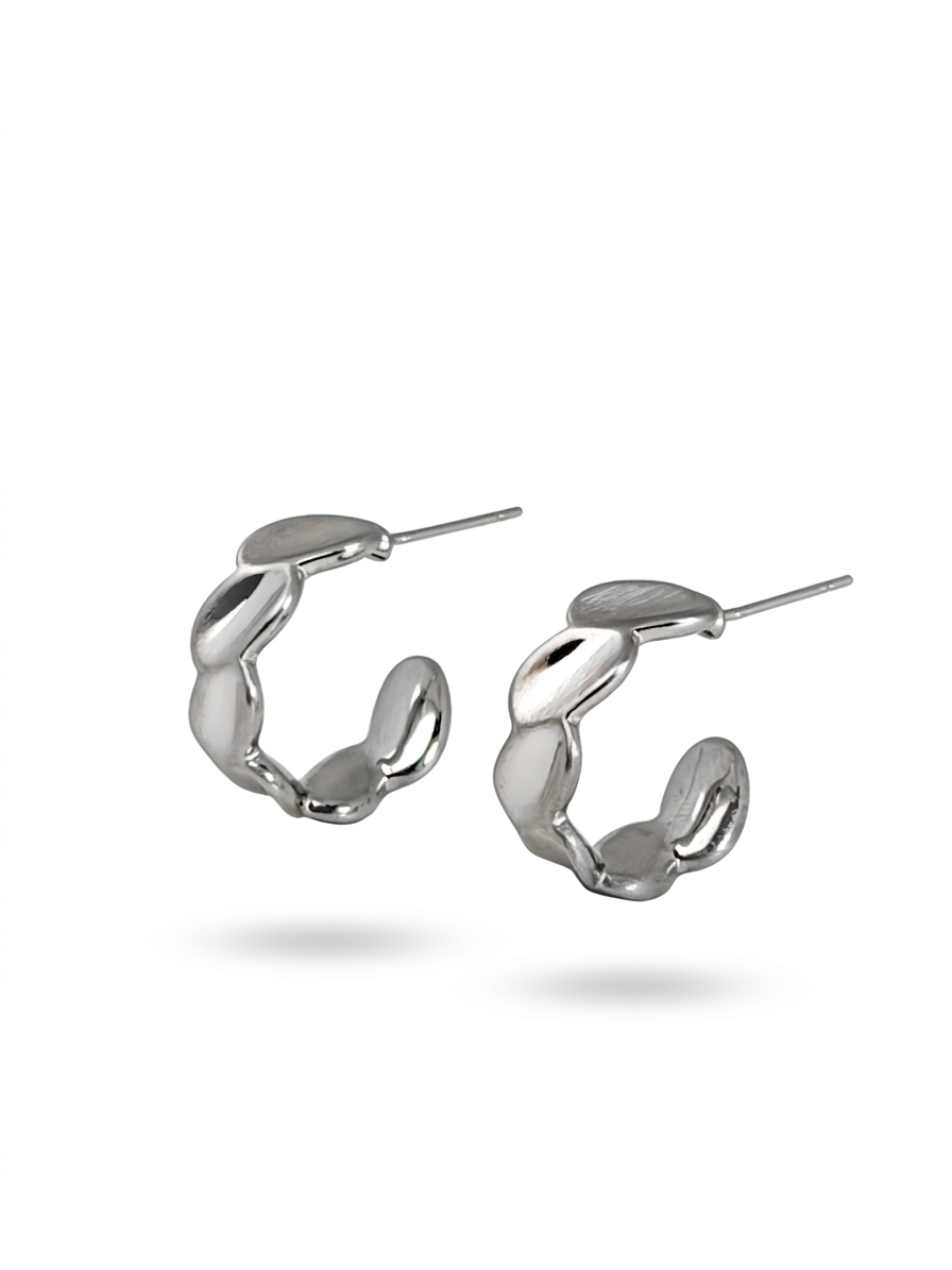Pear-shaped drop earrings with a bezel setting.