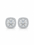 Pair of silver-tone stud earrings featuring round-cut clear gemstones enclosed in a cushion-shaped micropavé halo on a pure white studio background.