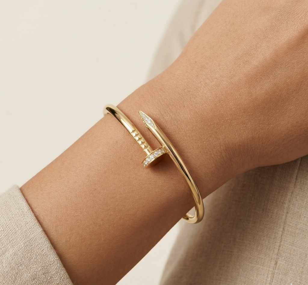 Women wearing Anti-tarnish 18K gold-plated crystal nail bangle.