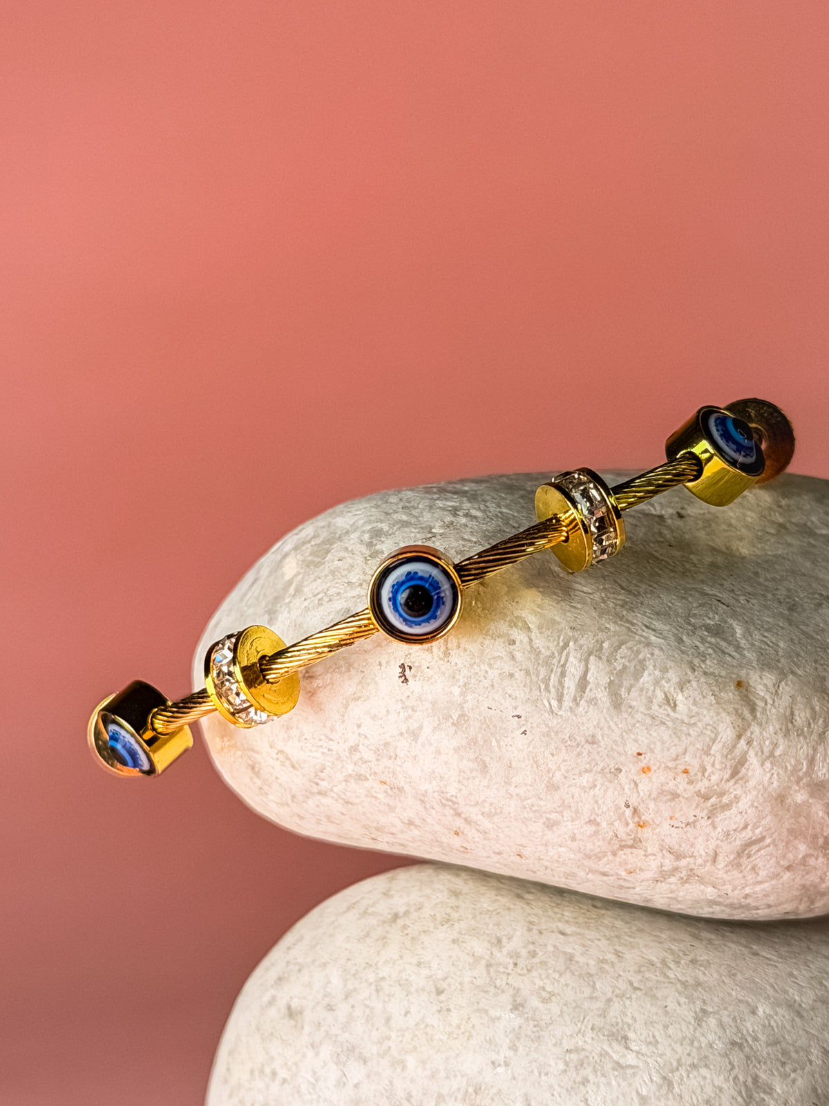  Anti-tarnish 18K gold-plated evil eye cable bangle.