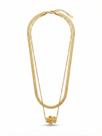 Anti-tarnish 18K gold-plated layered herringbone and twisted knot pendant necklace.